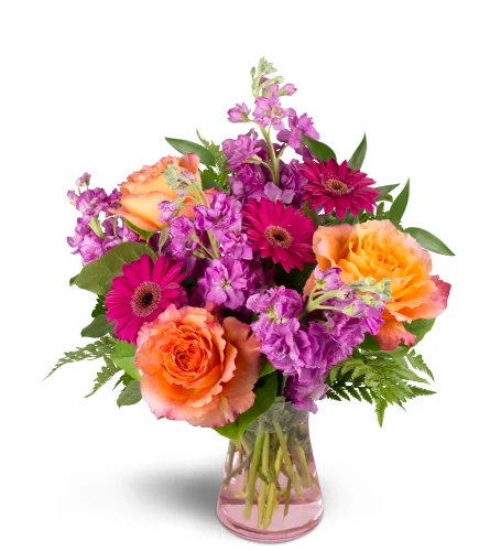 Invigorate-Timeless floral elegance with a mix of classic roses and seasonal blooms for anniversaries.