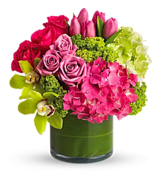 New Sensations-Vibrantly colored exotic flowers arrangement for an unforgettable anniversary celebration