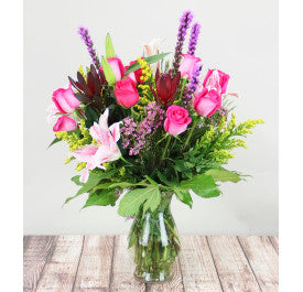 Pink Paradise-Anniversary bouquet with unique blooms and tropical flair for a special surprise